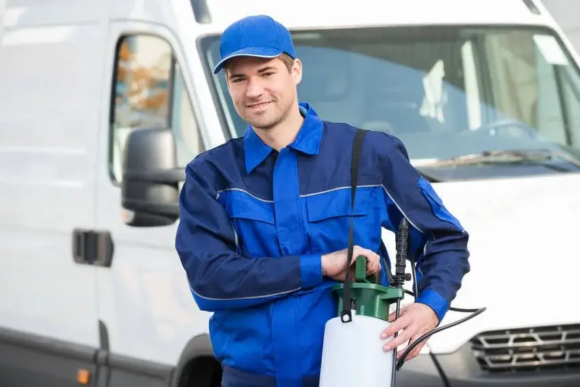 Professional exterminator ready for service; follow our bed bug preparation checklist to ensure effective treatment.